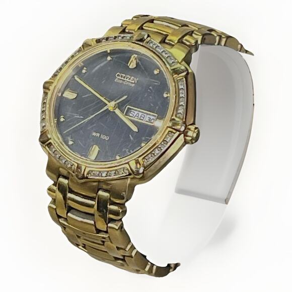 Citizen Eco-Drive Diamond Bezel Gold Tone Day Date Spanish WR100 Watch Works main image 6